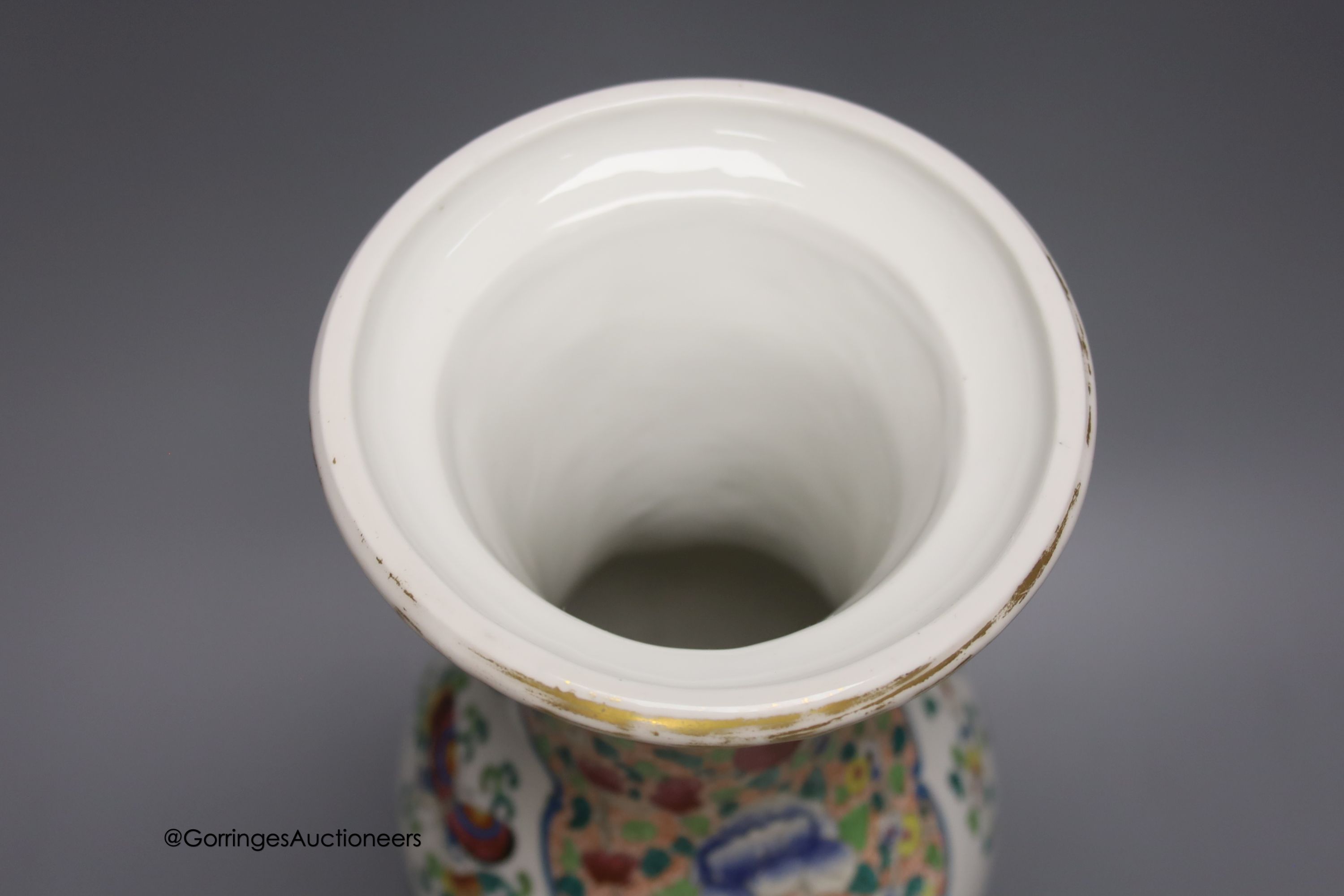 A 19th century French porcelain vase, enamelled in Chinese famille rose style, 38cm